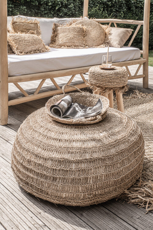 outdoor setting with seagrass pouffe