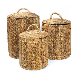Three banana leaf baskets with lids