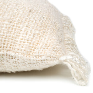 detail shot of coarsely woven white cushion