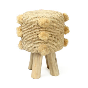 stool made of raffie with pom pom on it