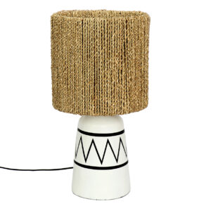 white lamp with black decoration and seagrass lampshade