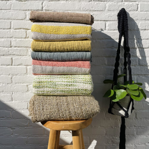 stack of plaids on stool