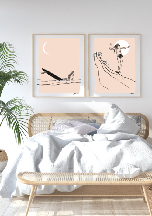 bedroom with two surf illustrations on the wall