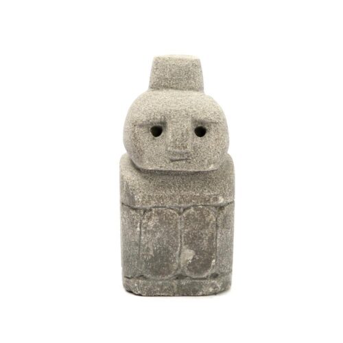 carved sandstone statuette from Indonesia in gray on white background