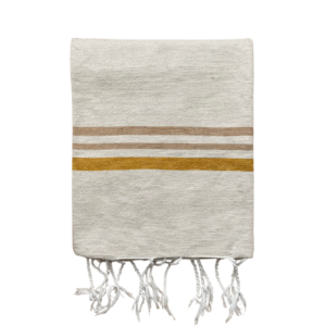 folded plaid in off-white with sand-colored and ocher stripes