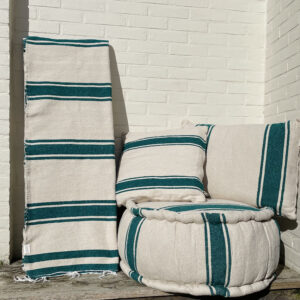 Florida collection consisting of a plaid, two pillows and an ottoman. In one color off white with emerald green stripes
