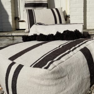 pouf, pillow and blanket in cream colored with brown stripes